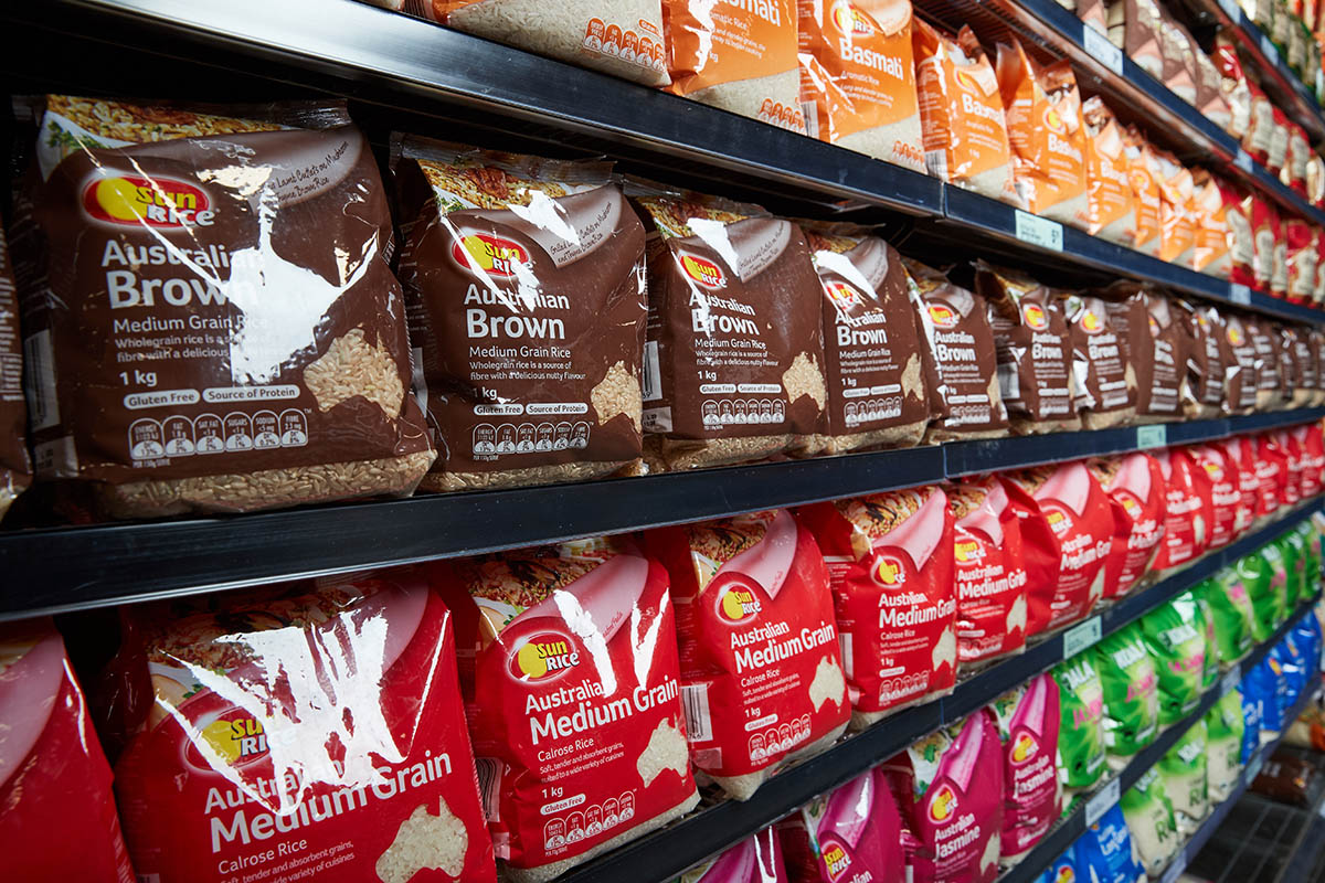 SunRice packets on a supermarket shelf