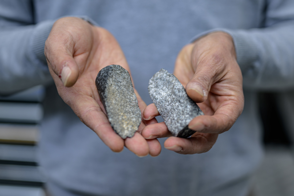 Man holding rocks