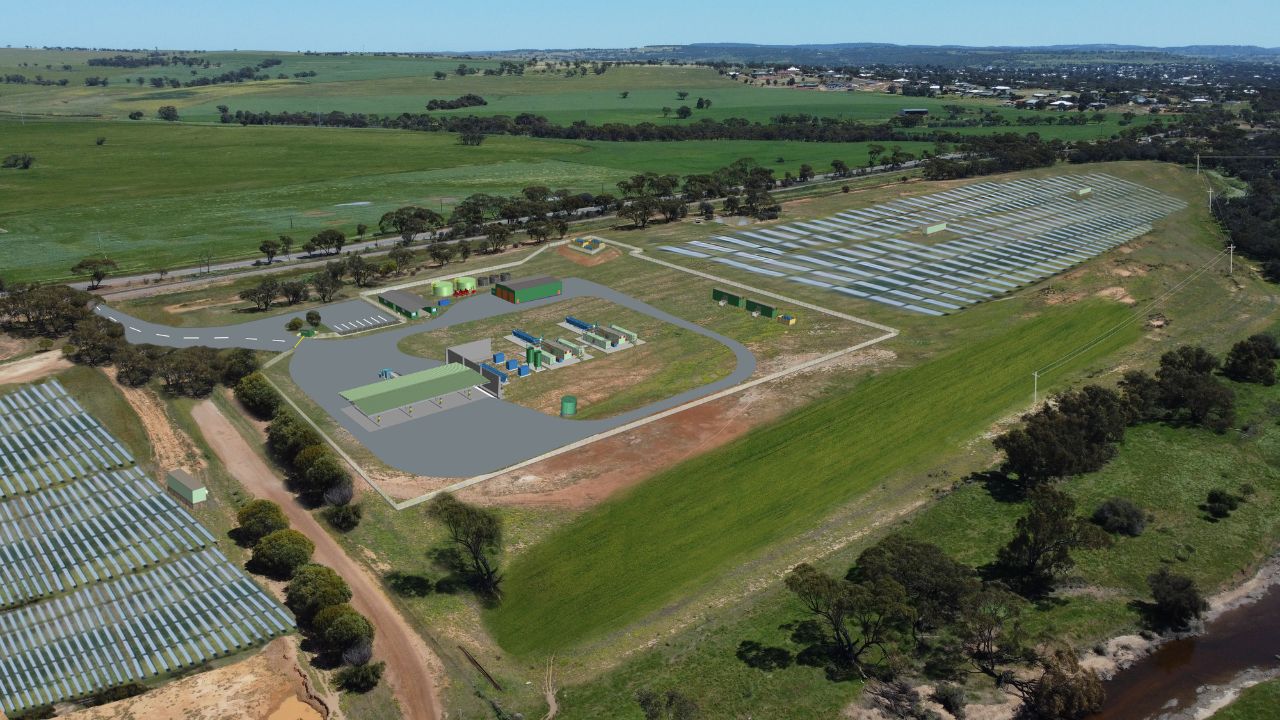 Large grass fields with pipes for a renewable hydrogen plant