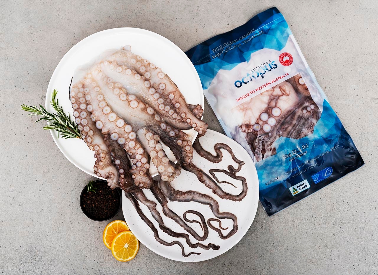 Fresh octopus on a plate alongside Abrolhos packaged octopus