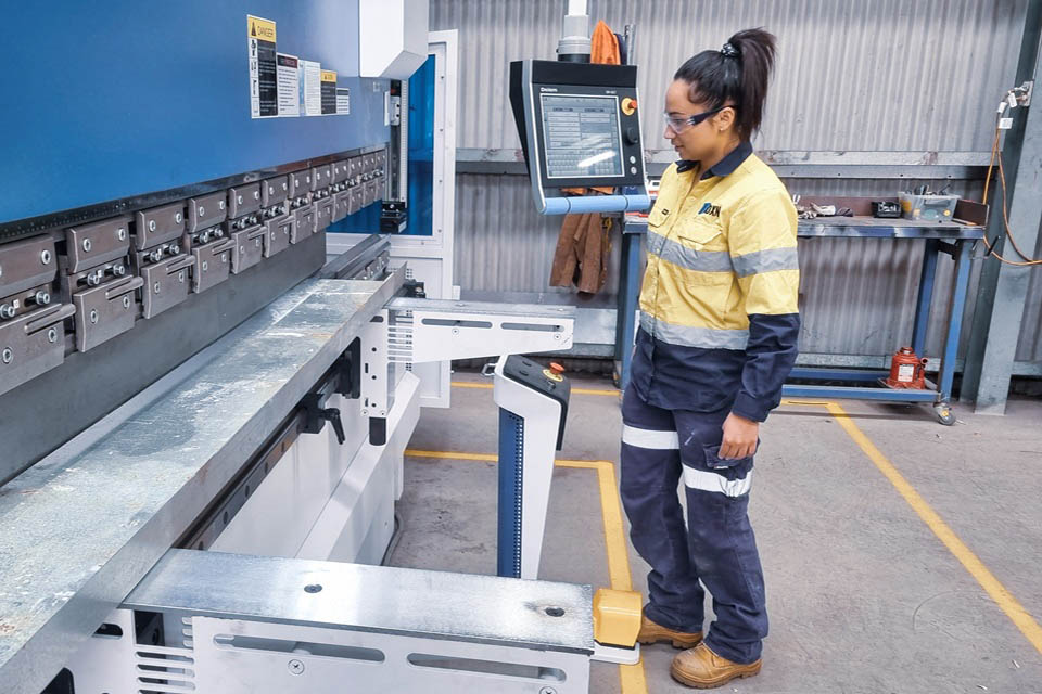 Worker in manufacturing plant